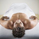 bigstock-Man-laying-on-massage-table-32551937 (1)