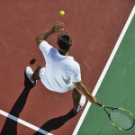 bigstock_young_man_play_tennis_outdoor__14840021